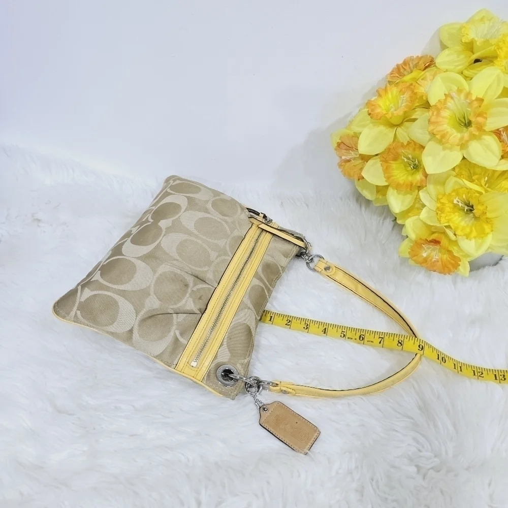 Coach yellow and tan satchel bag